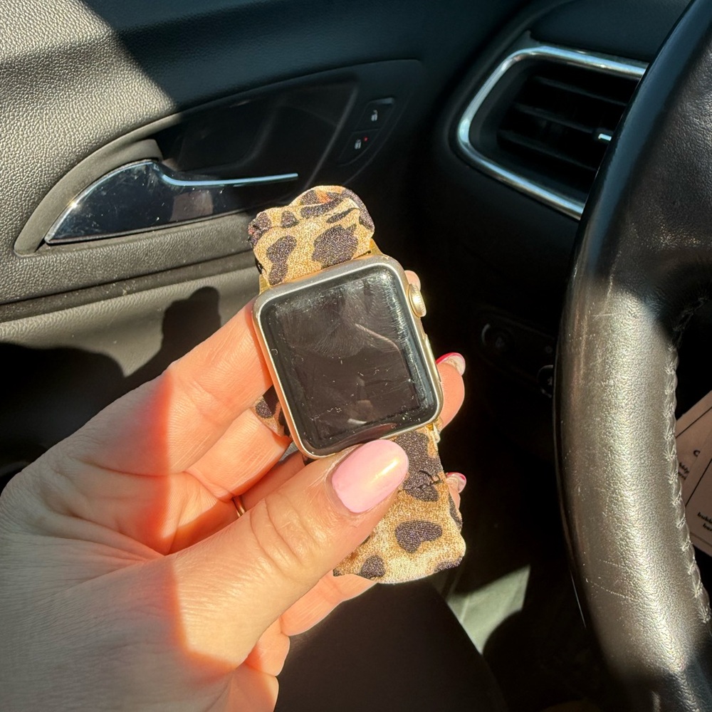 Apple Watch series 7000- Gold with leopard print scrunchie band